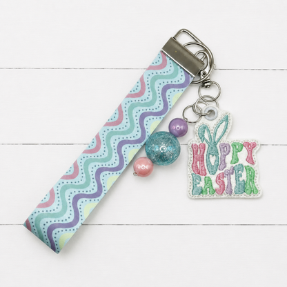 Hoppy Easter Keychain and Wristlet — clean white wood primary image