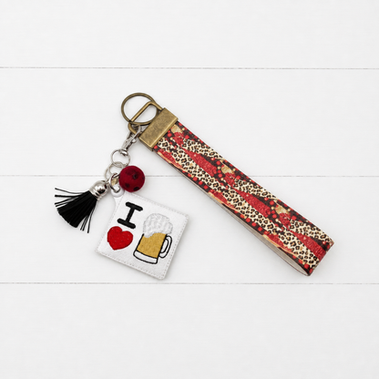 I Love Beer Keychain and Wristlet — clean white wood primary image