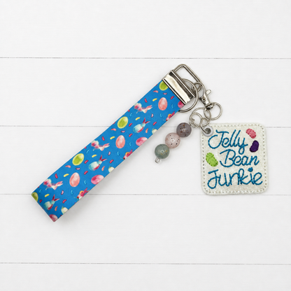 Jelly Bean Junkie Keychain and Wristlet — clean white wood primary image
