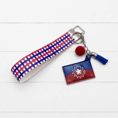Juneteenth Keychain and Wristlet — clean white wood primary image