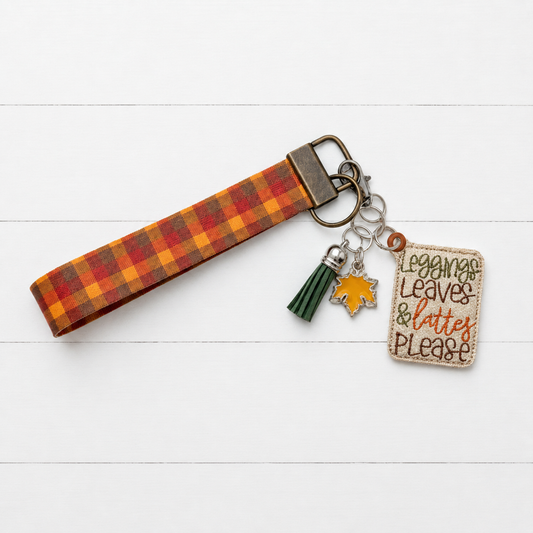 Leggings, Leaves, & Lattes Keychain and wristlet — clean white wood primary image