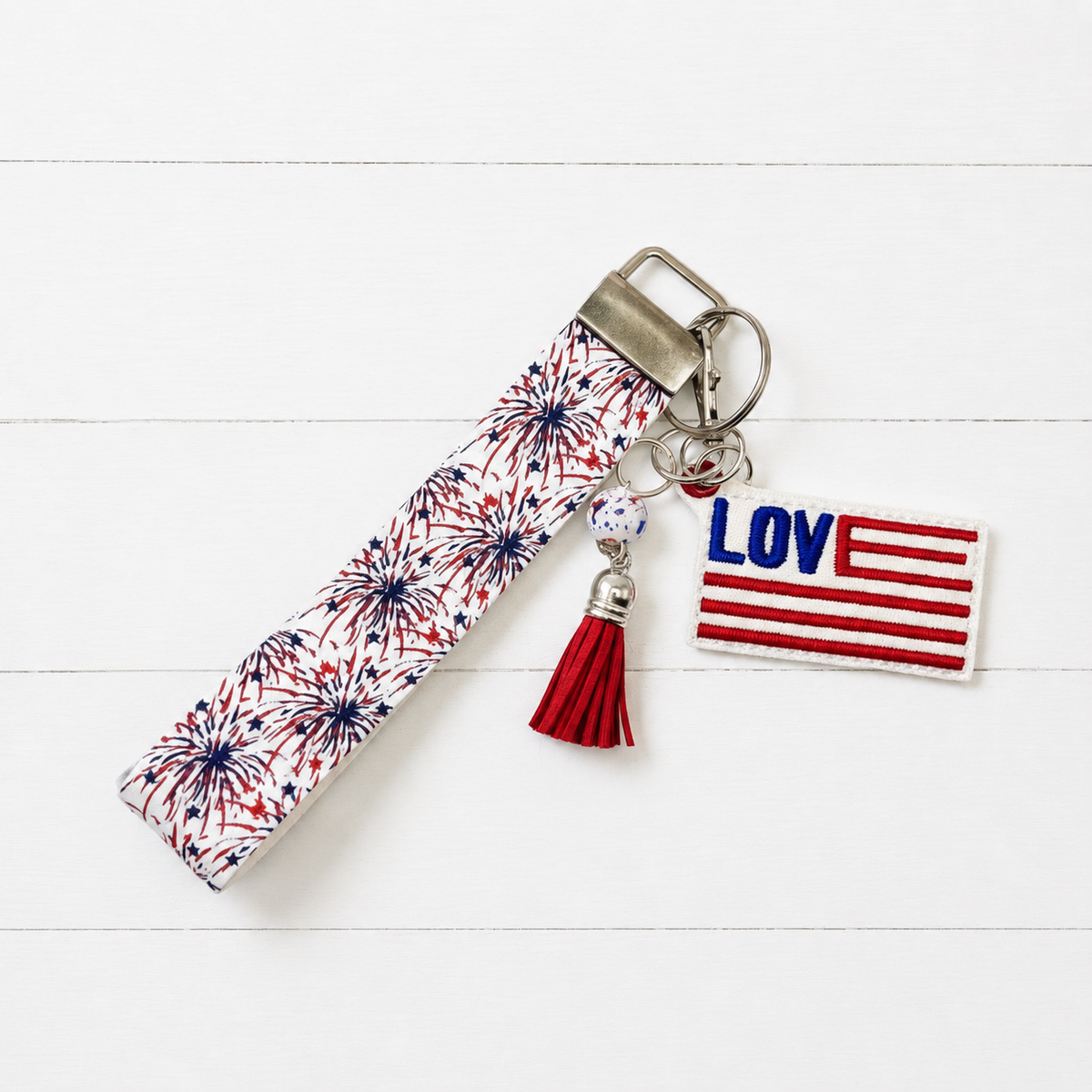Love American Flag Keychain and Wristlet — clean white wood primary image