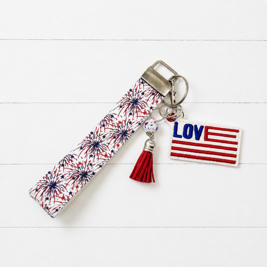 Love American Flag Keychain and Wristlet — clean white wood primary image