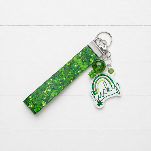 Lucky Rainbow Keychain and Wristlet — clean white wood primary image