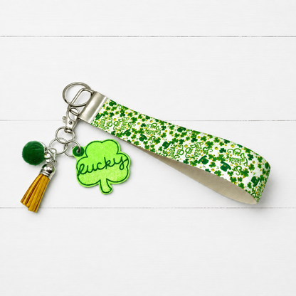 Lucky Shamrock Keychain and Wristlet — clean white wood primary image