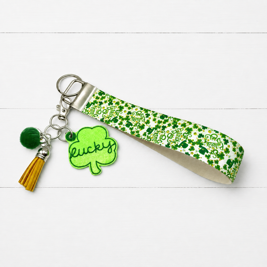 Lucky Shamrock Keychain and Wristlet — clean white wood primary image