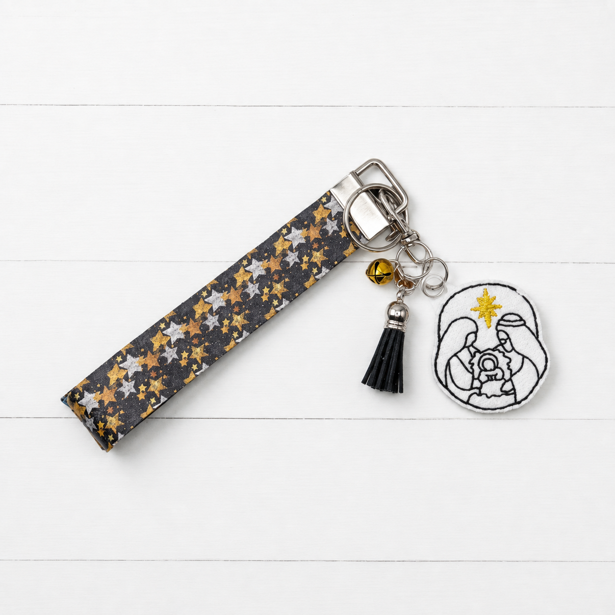 Nativity Keychain and Wristlet — clean white wood primary image
