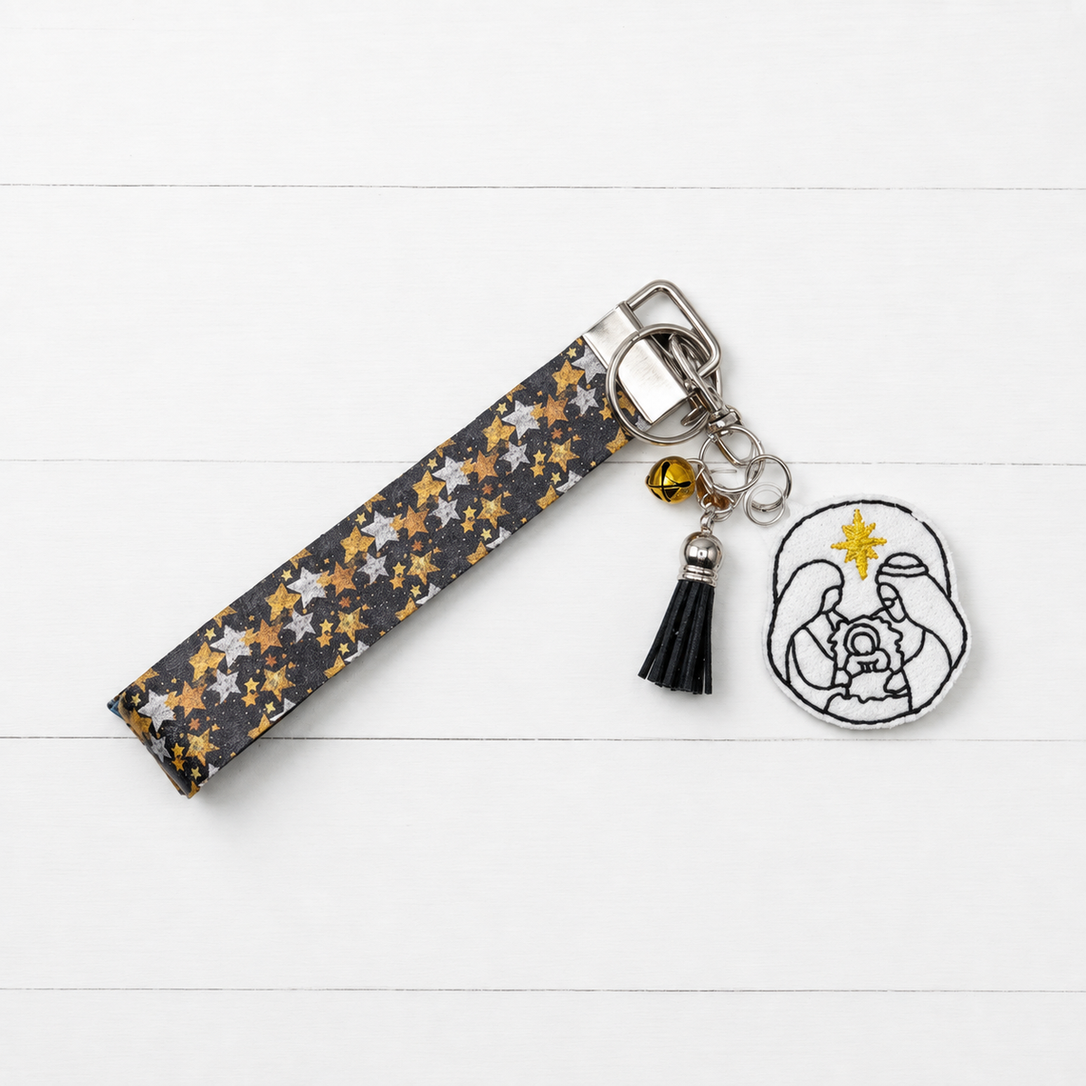 Nativity Keychain and Wristlet — clean white wood primary image