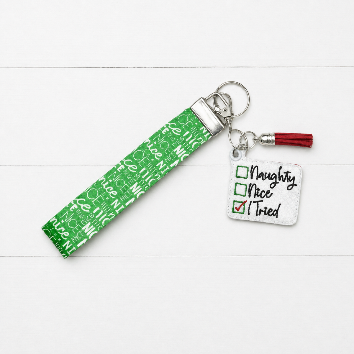 Naughty, Nice, I Tried Keychain and Wristlet — clean white wood primary image