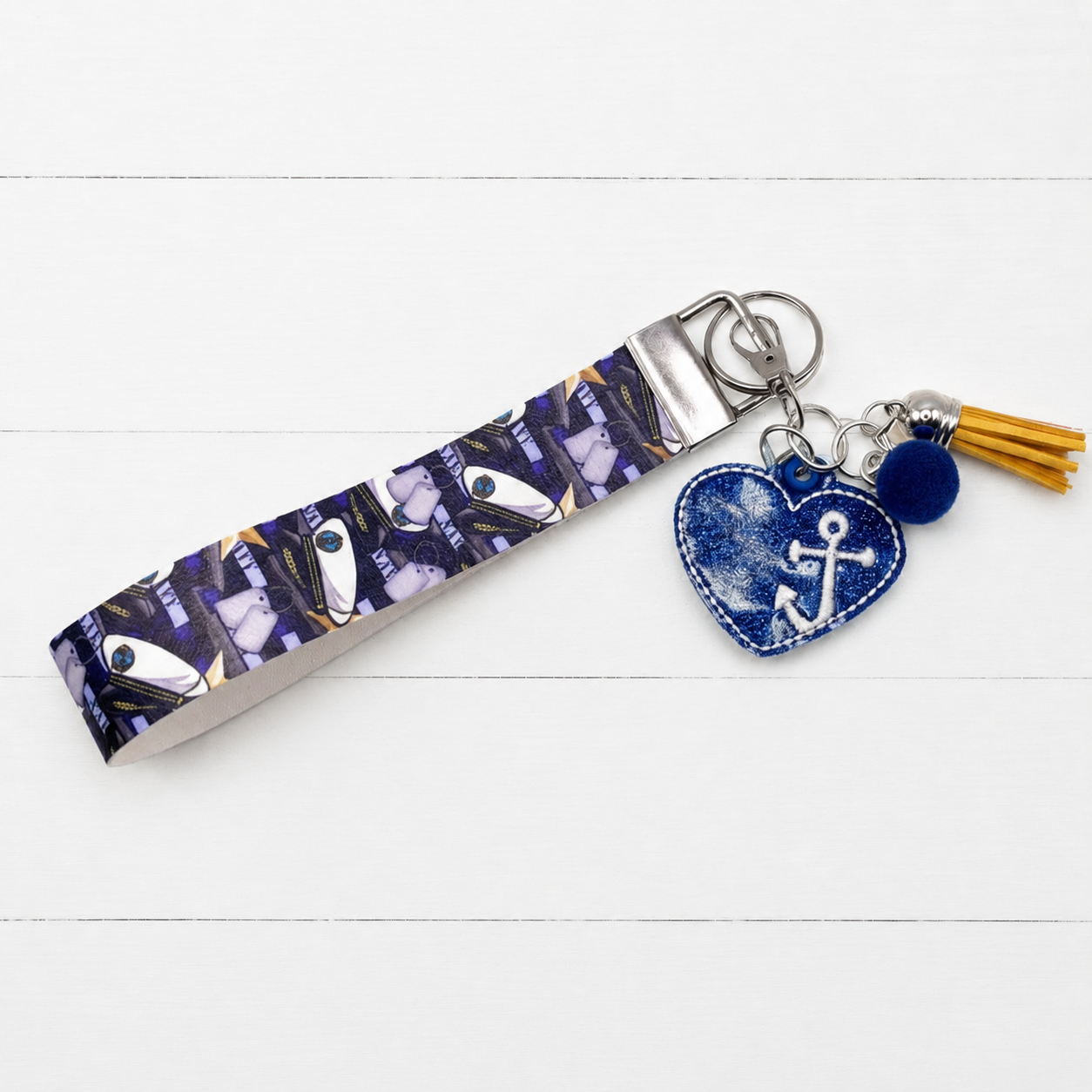 Navy heart Keychain and Wristlet — clean white wood primary image