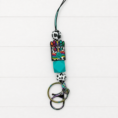 Leopard Crayons Lanyard on a clean white wood background