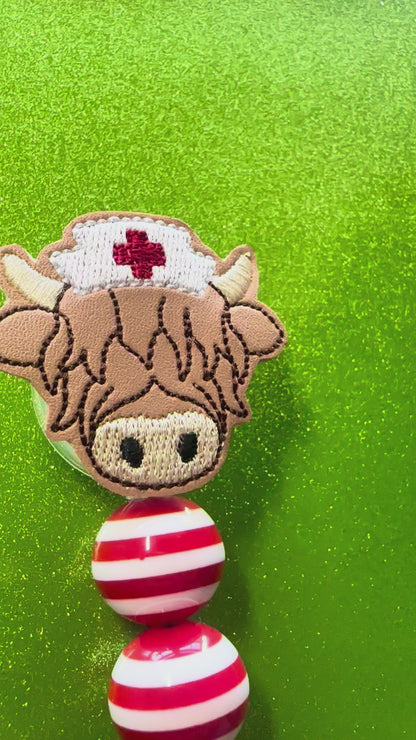 Highland cow nurse badge reel