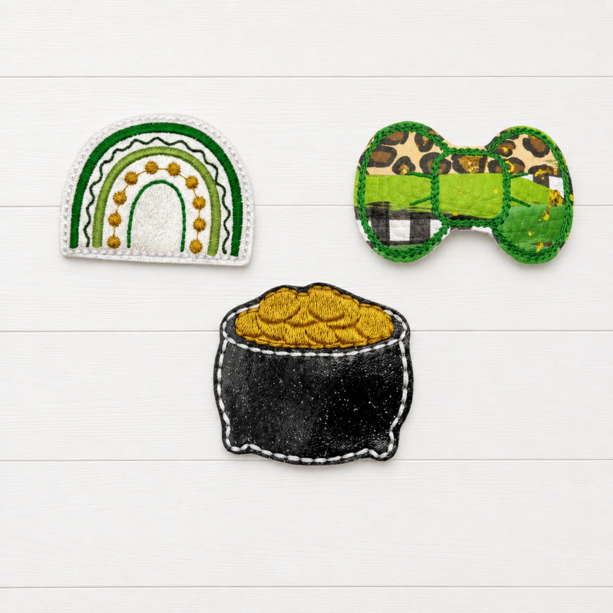 Saint Patrick’s Day Hair Bow Clip Set on a clean white wood background