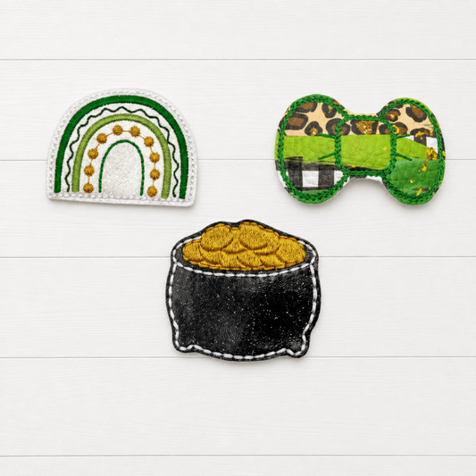 Saint Patrick’s Day Hair Bow Clip Set on a clean white wood background