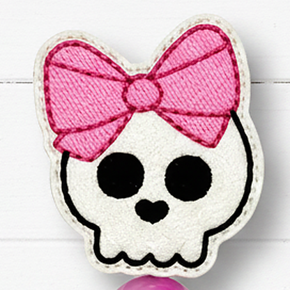 Skull with Bow Halloween Badge Reel