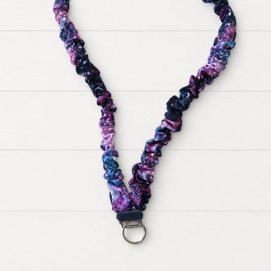 Space Scrunchie Lanyard on a clean white wood background