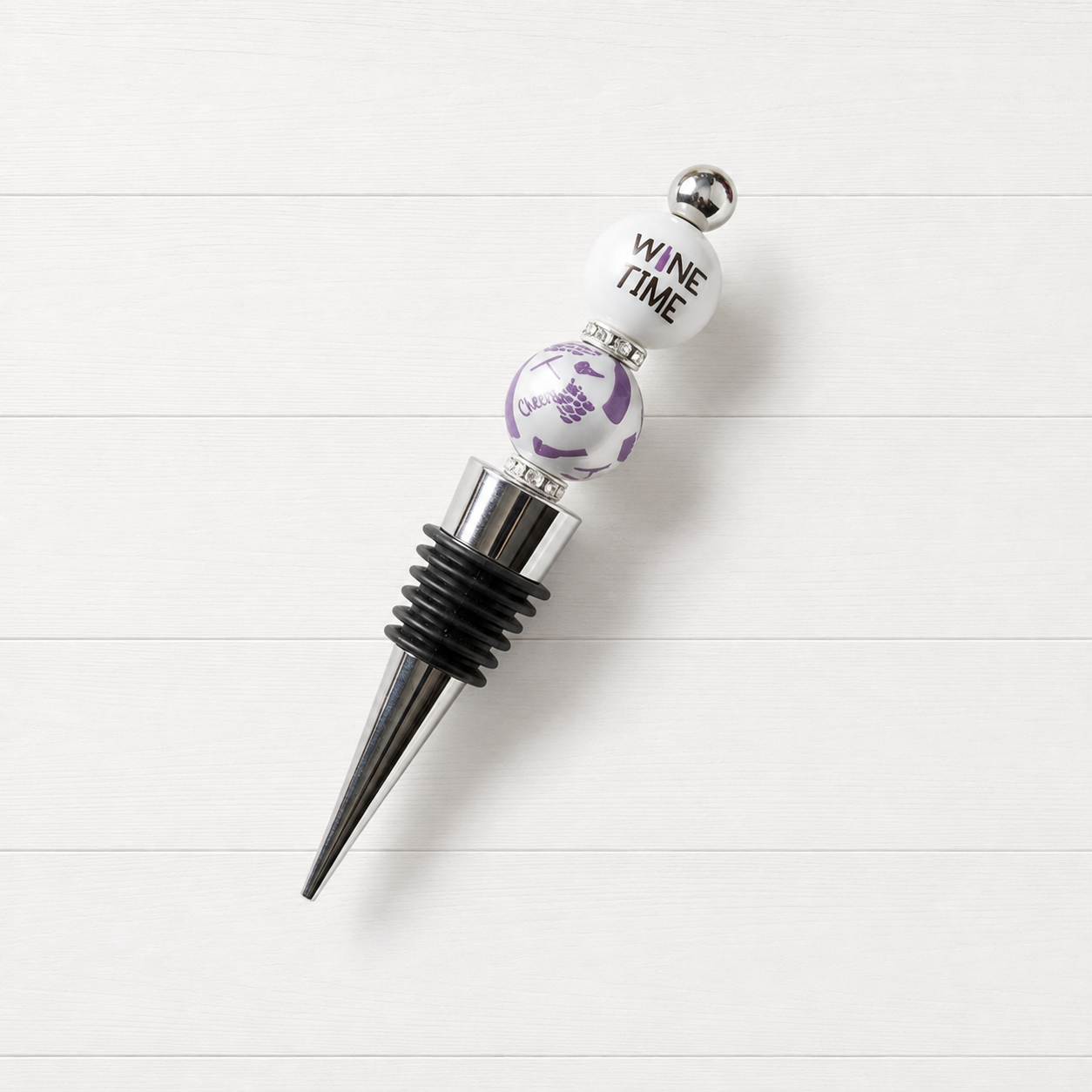 Wine Time bottle stopper on a clean white wood background