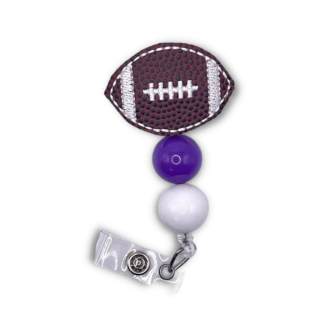 Purple and White Football Badge Reel